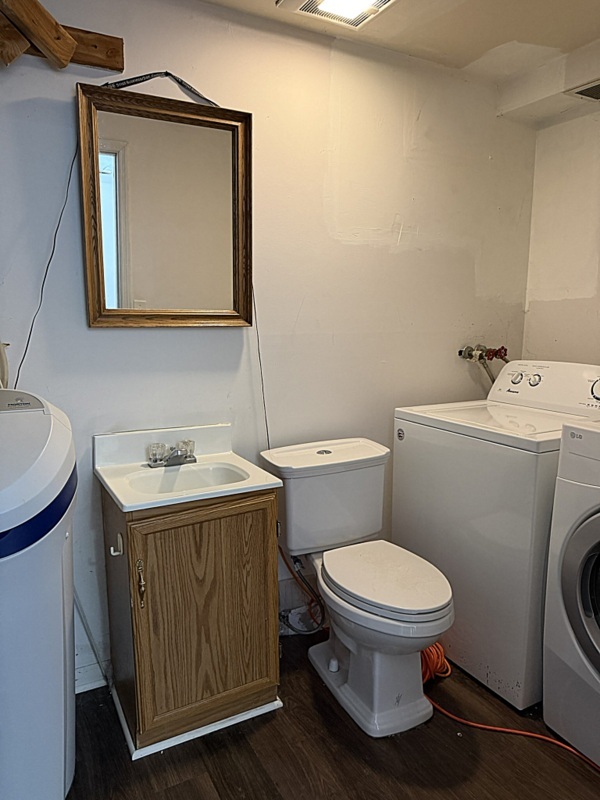 620 South 9th Avenue St. Charles, IL 60174 - Photo 23 of 30 a bathroom with a toilet a sink and mirror
