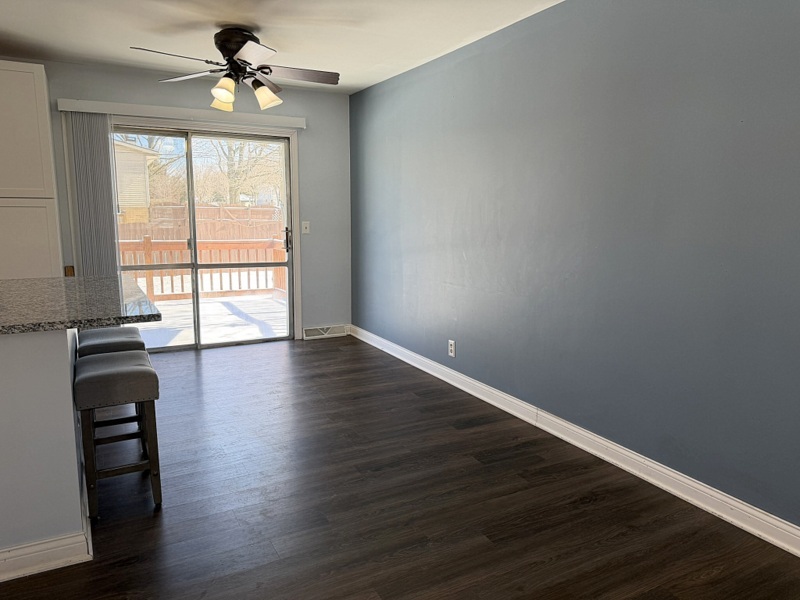 620 South 9th Avenue St. Charles, IL 60174 - Photo 6 of 30 a view of empty room with wooden floor and fan