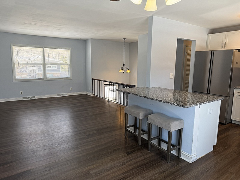 620 South 9th Avenue St. Charles, IL 60174 - Photo 8 of 30 a room with wooden floor and windows