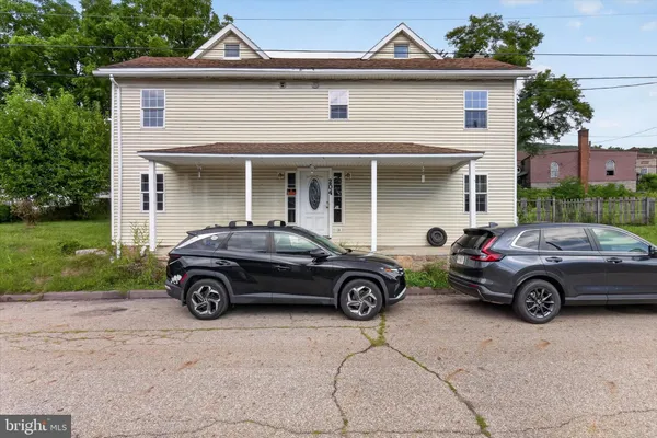 a car parked in front of a house