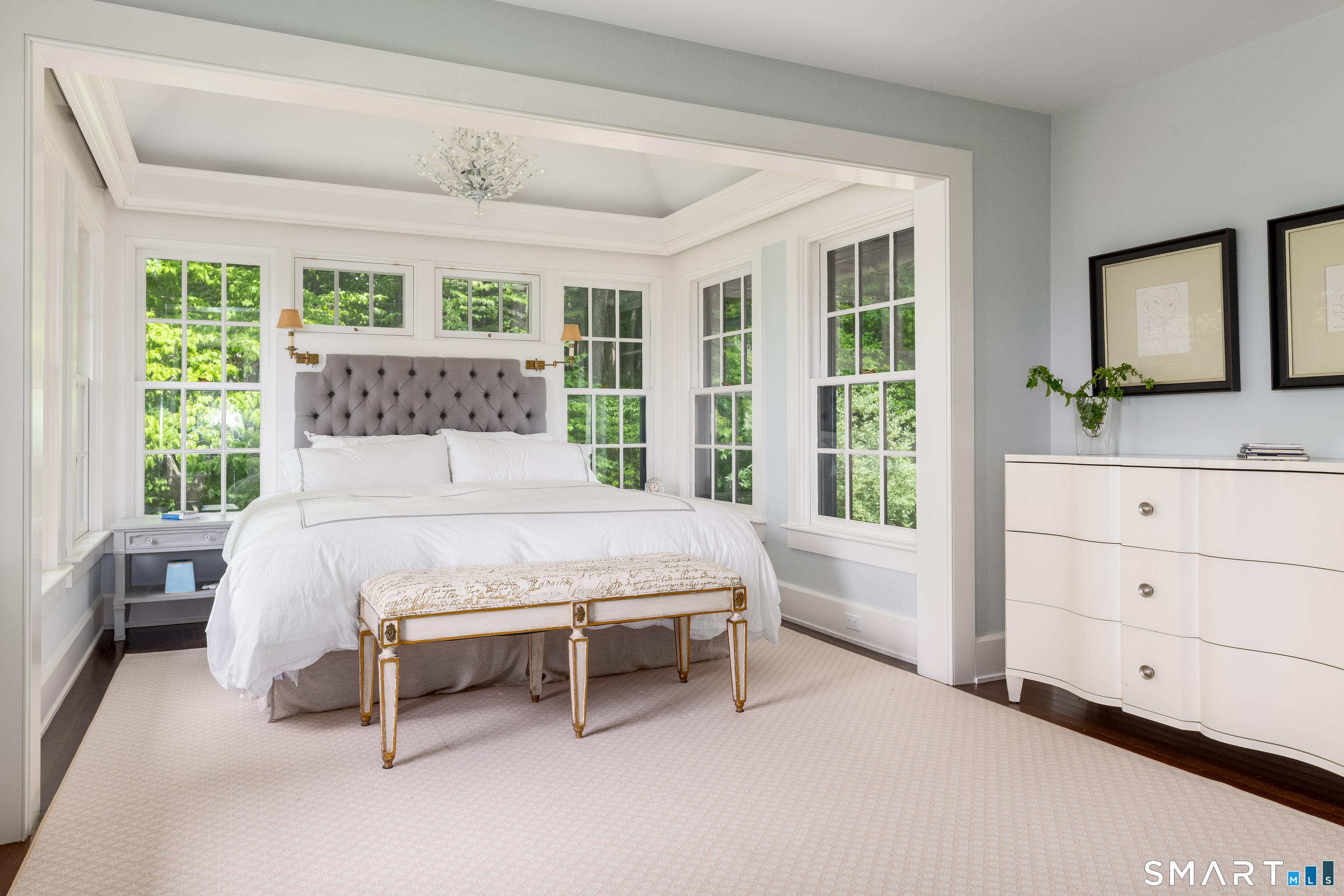 240 Umpawaug Road Redding, CT 06896 - Photo 16 of 40 The Primary Bedroom Suite. A breathtaking expansion to the original structure with banks of windows, spectacular views, walk-in closet and full bath.