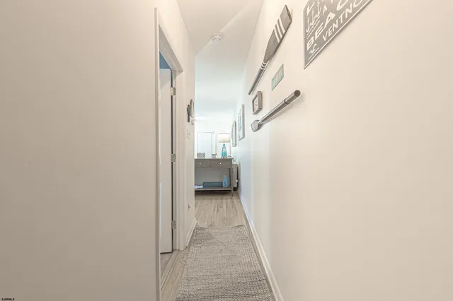 a view of a hallway view with staircase