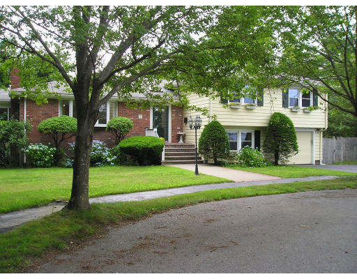 51 Sevinor Road Marblehead, MA 01945 - Photo 1 of 12 a front view of a house with a yard and trees