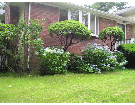 51 Sevinor Road Marblehead, MA 01945 - Photo 12 of 12 a front view of a house with garden