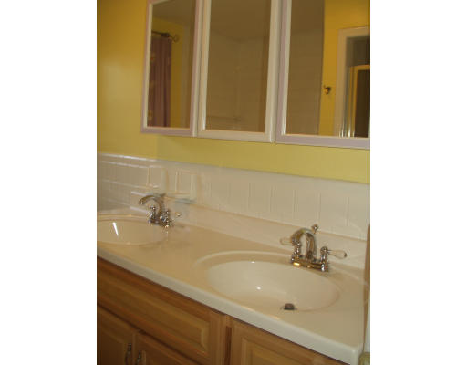 51 Sevinor Road Marblehead, MA 01945 - Photo 9 of 12 a bathroom with a sink and a mirror