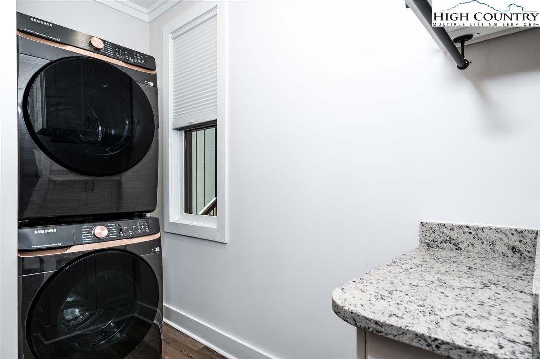 240 Ridgeline Drive, Unit D Sugar Mountain, NC 28604 - Photo 12 of 30 a utility room with dryer and washer