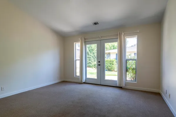 an empty room with windows