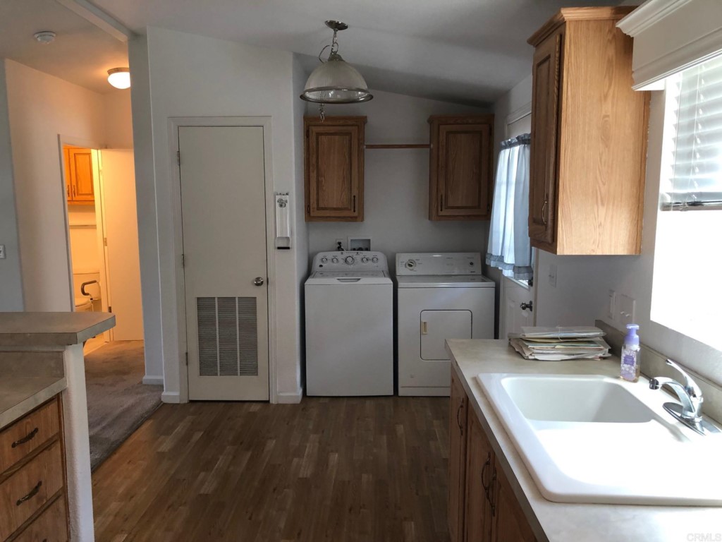 12306 Old Pomerado Road, Unit 14 Poway, CA 92064 - Photo 14 of 20 a bathroom with a sink a vanity and a mirror