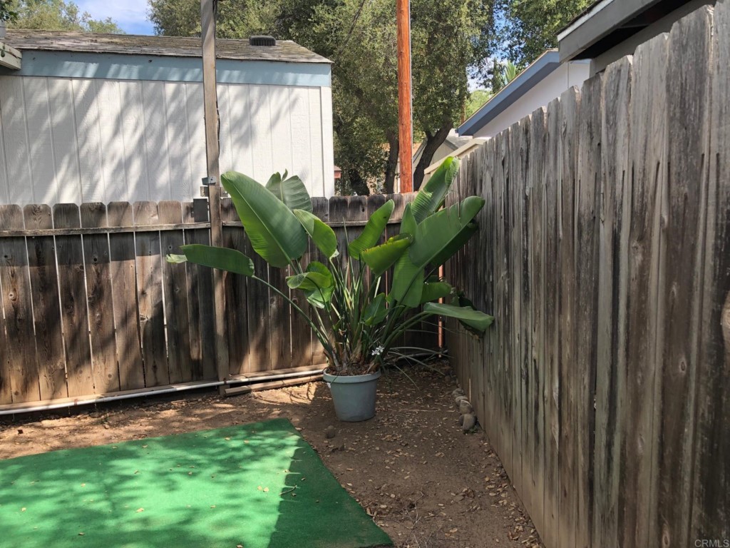 12306 Old Pomerado Road, Unit 14 Poway, CA 92064 - Photo 8 of 20 a view of a backyard with a garden