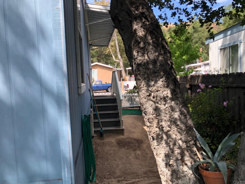 12306 Old Pomerado Road, Unit 14 Poway, CA 92064 - Photo 9 of 20 a view of stairs and flowers