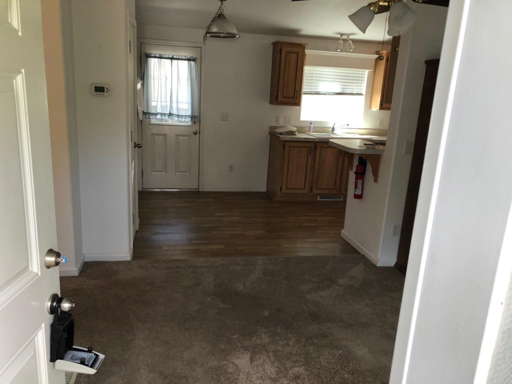 12306 Old Pomerado Road, Unit 14 Poway, CA 92064 - Photo 10 of 20 a bathroom with a sink and a mirror