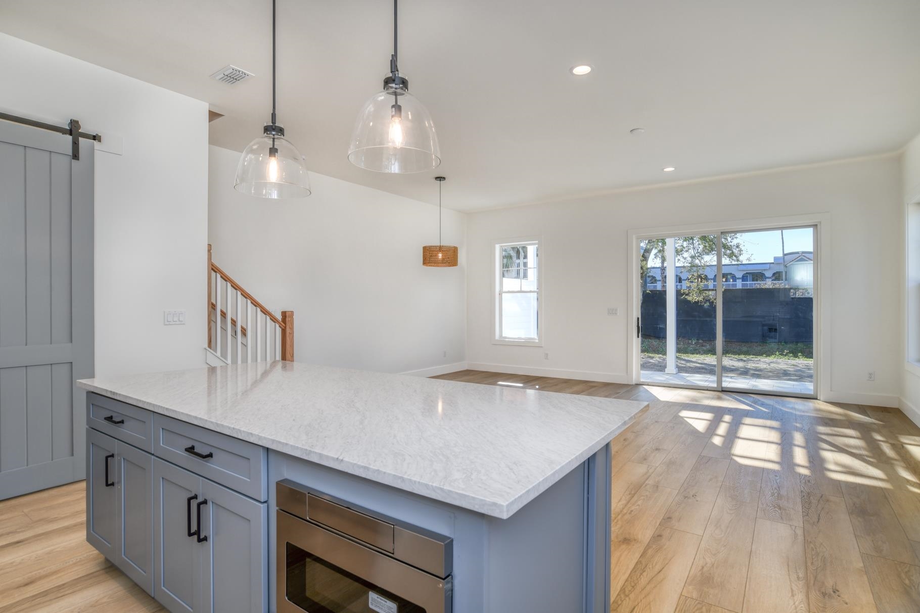7 Sebastian Avenue, Unit C St. Augustine, FL 32084 - Photo 13 of 42 a view of a kitchen with a sink a window and appliances