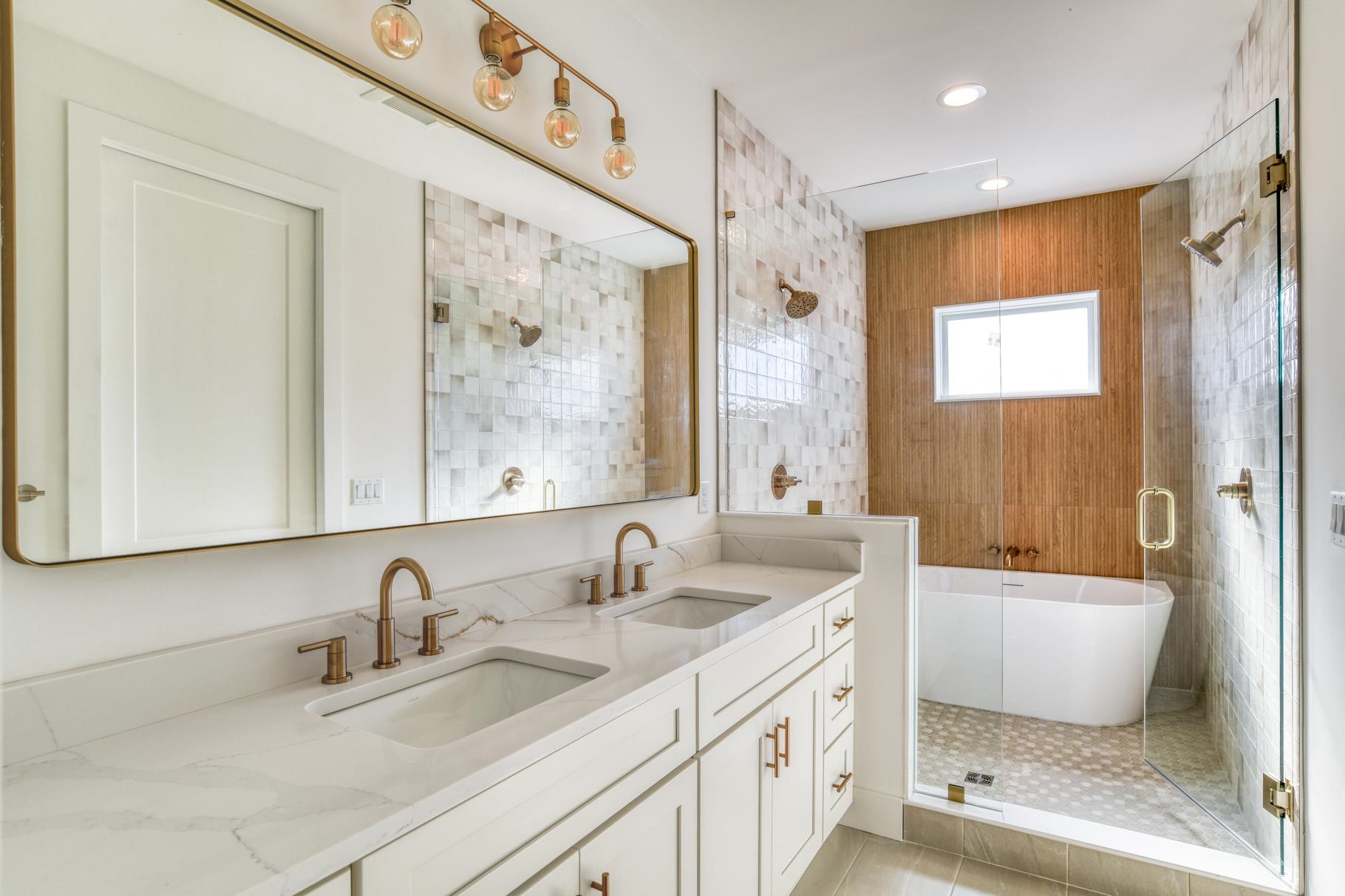 7 Sebastian Avenue, Unit C St. Augustine, FL 32084 - Photo 22 of 42 a bathroom with a granite countertop sink toilet and shower