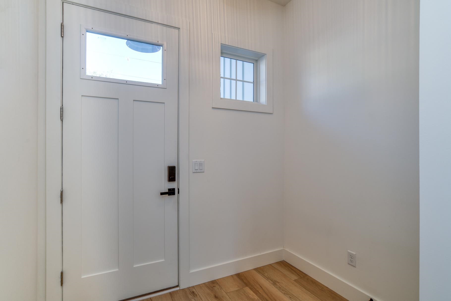 7 Sebastian Avenue, Unit C St. Augustine, FL 32084 - Photo 3 of 42 a view of a room with wooden floor and closet