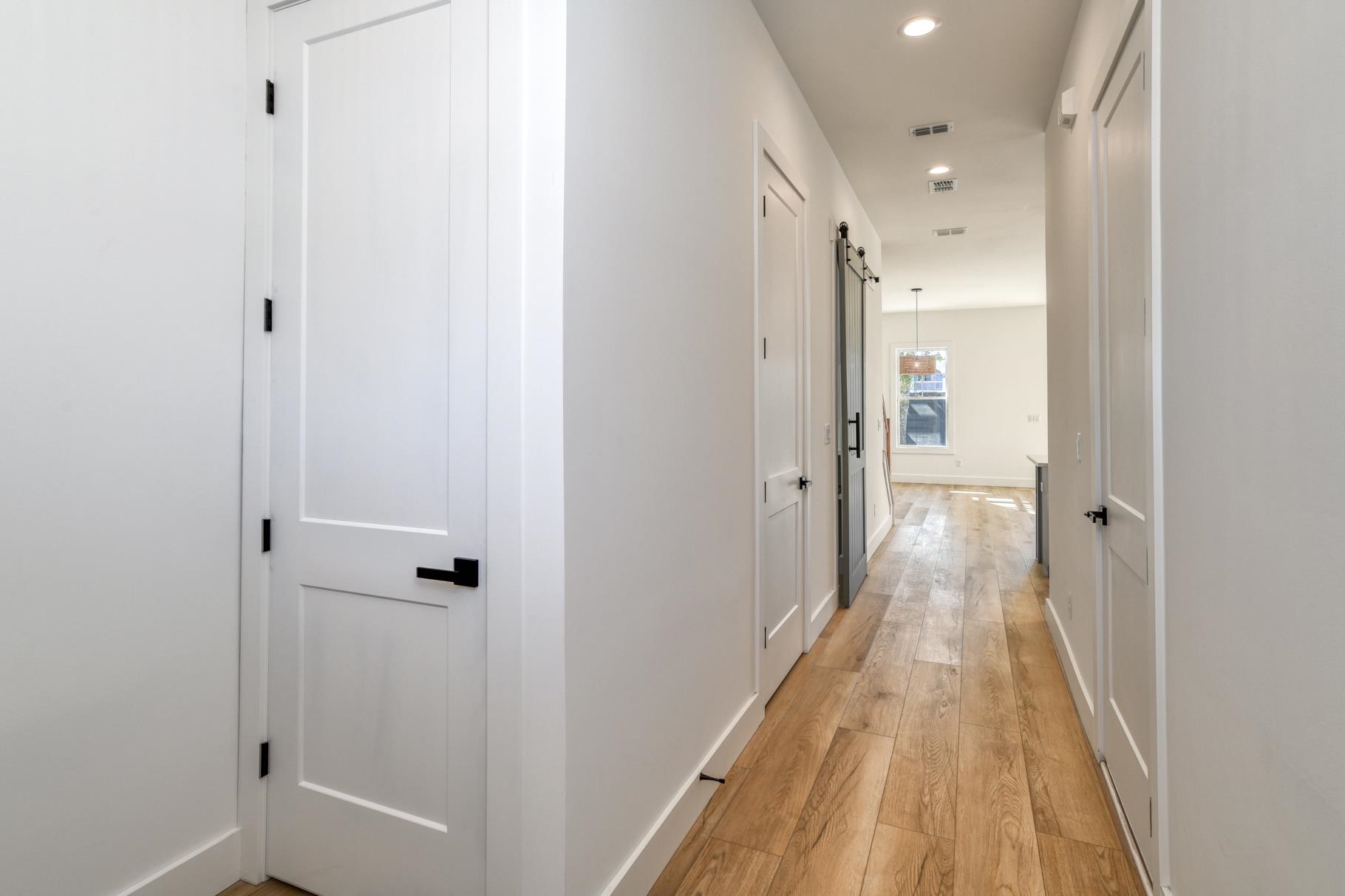 7 Sebastian Avenue, Unit C St. Augustine, FL 32084 - Photo 4 of 42 a view of a bathroom from a hallway