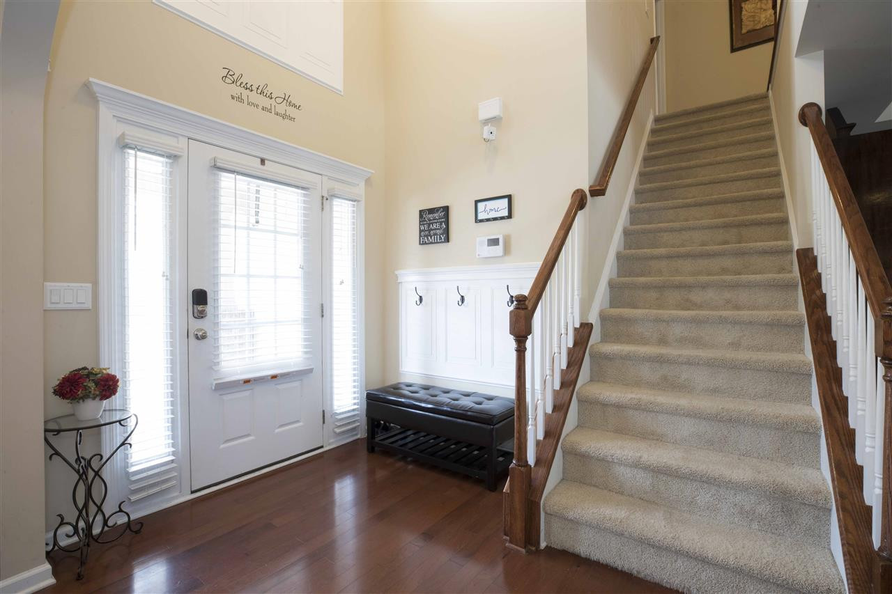 Welcoming Foyer with Hooks for Coats or Bags