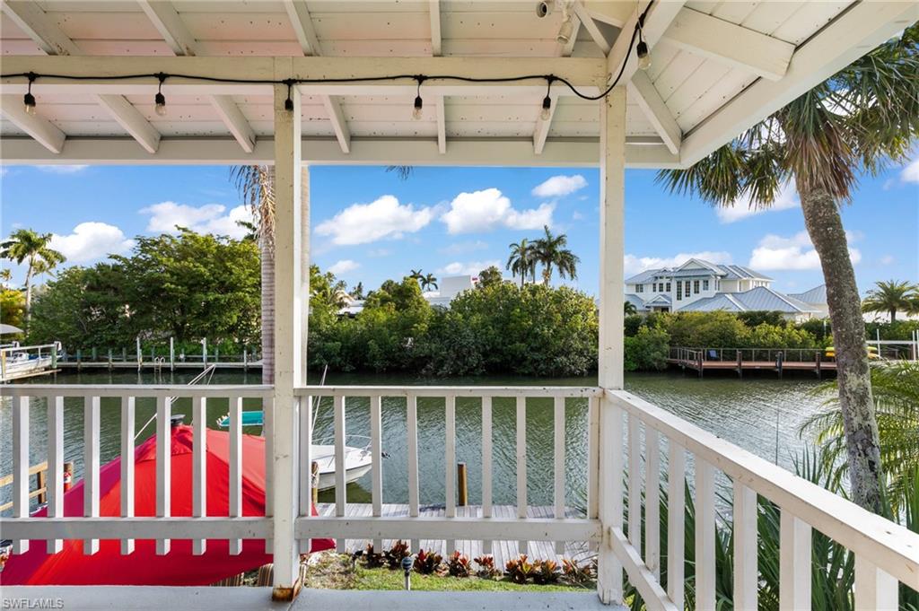 1360 Chesapeake Avenue Naples, FL 34102 - Photo 9 of 22 Wooden terrace featuring a water view