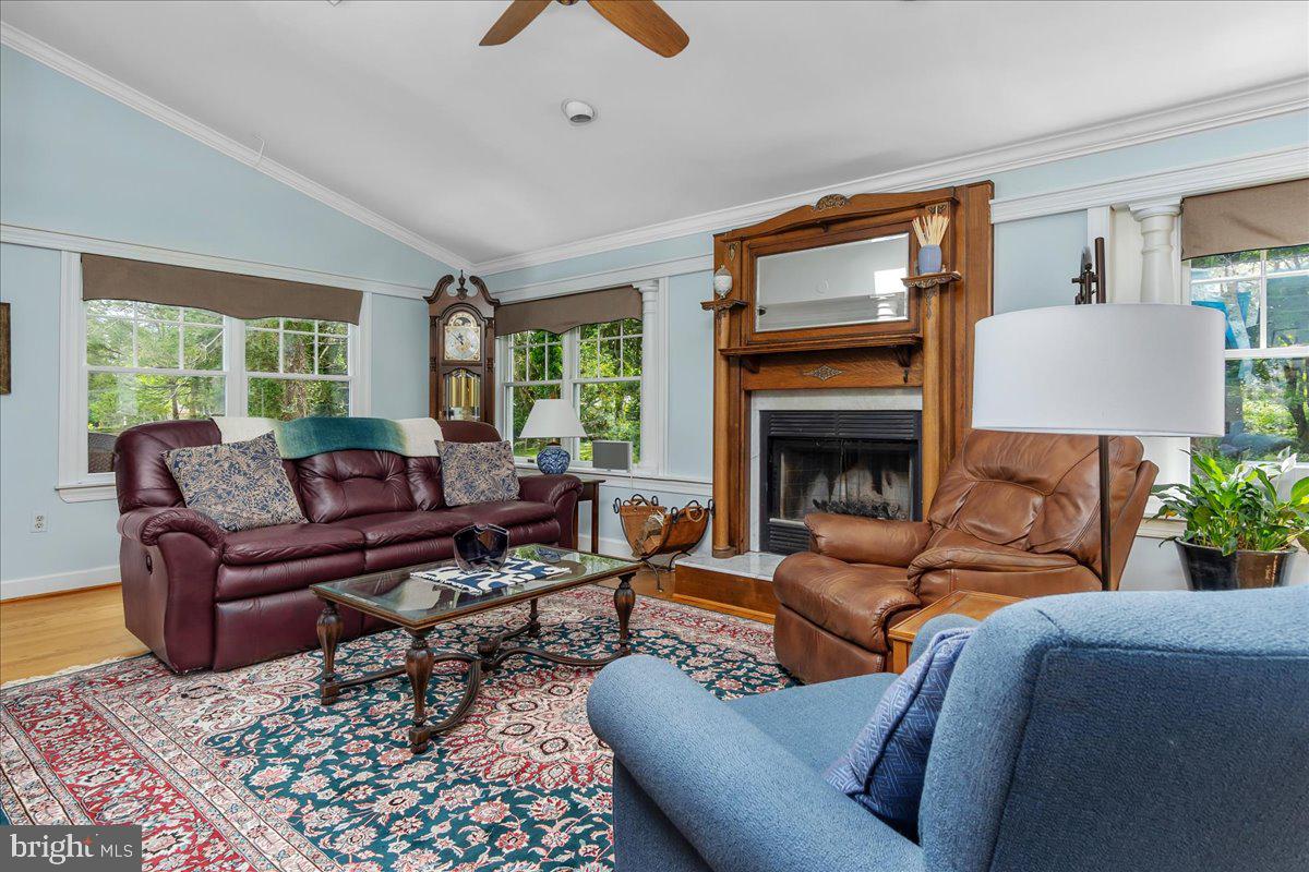 517 Valley View Road Towson, MD 21286 - Photo 33 of 89 a living room with furniture fireplace and a large window