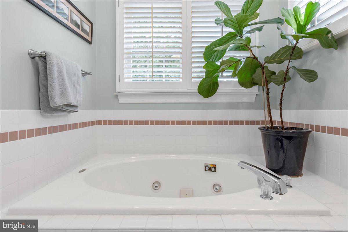517 Valley View Road Towson, MD 21286 - Photo 59 of 89 a bath tub sitting next to a window