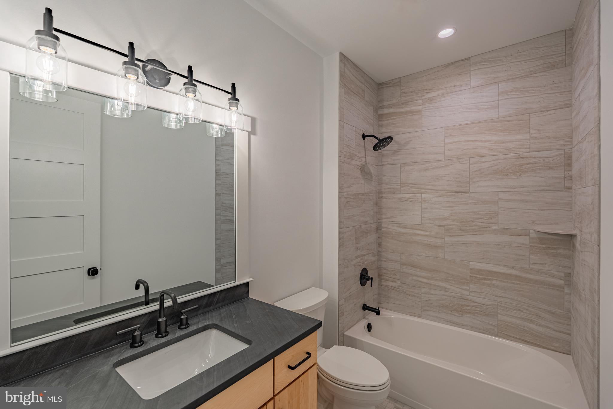 732 Emory Court Horsham, PA 19044 - Photo 18 of 21 a bathroom with a sink and a mirror