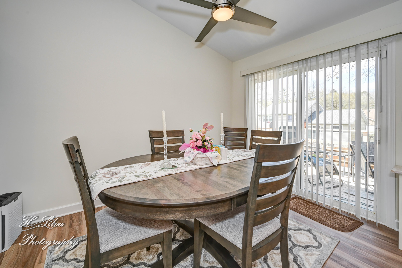 1109 Needham Road Naperville, IL 60563 - Photo 7 of 16 a view of a dining room with furniture and a window