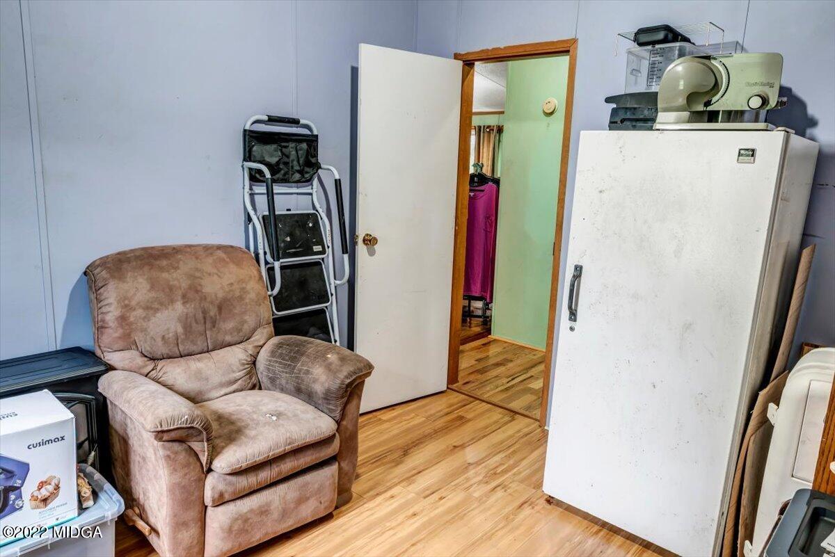 3401 Whitaker Road Roberta, GA 31078 - Photo 17 of 39 a living room with furniture and a wooden floor