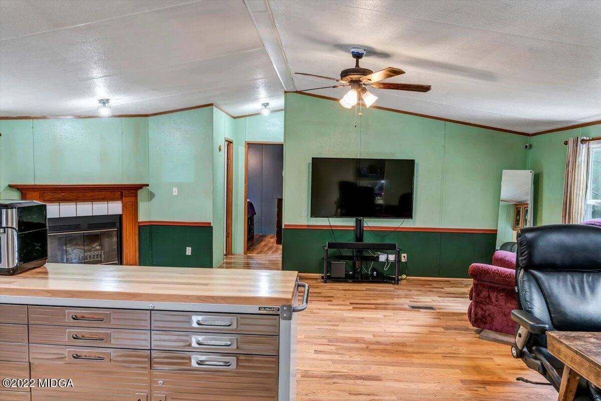 3401 Whitaker Road Roberta, GA 31078 - Photo 7 of 39 a kitchen with a refrigerator and a sink