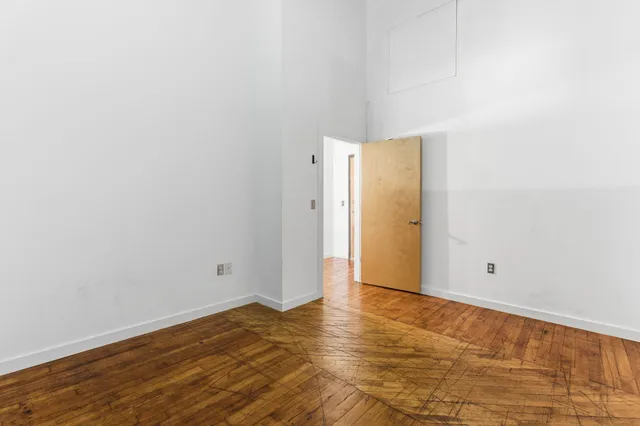 a view of a chairs and table in a patio