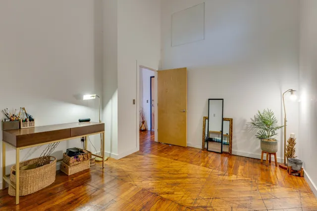 a view of a building with a yard