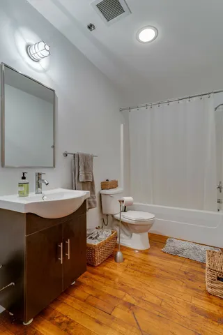 a swimming pool with outdoor seating and yard