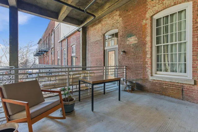 a view of a pathway with a building in the background