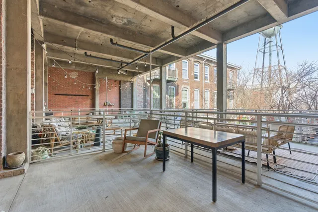 a view of a balcony with city view