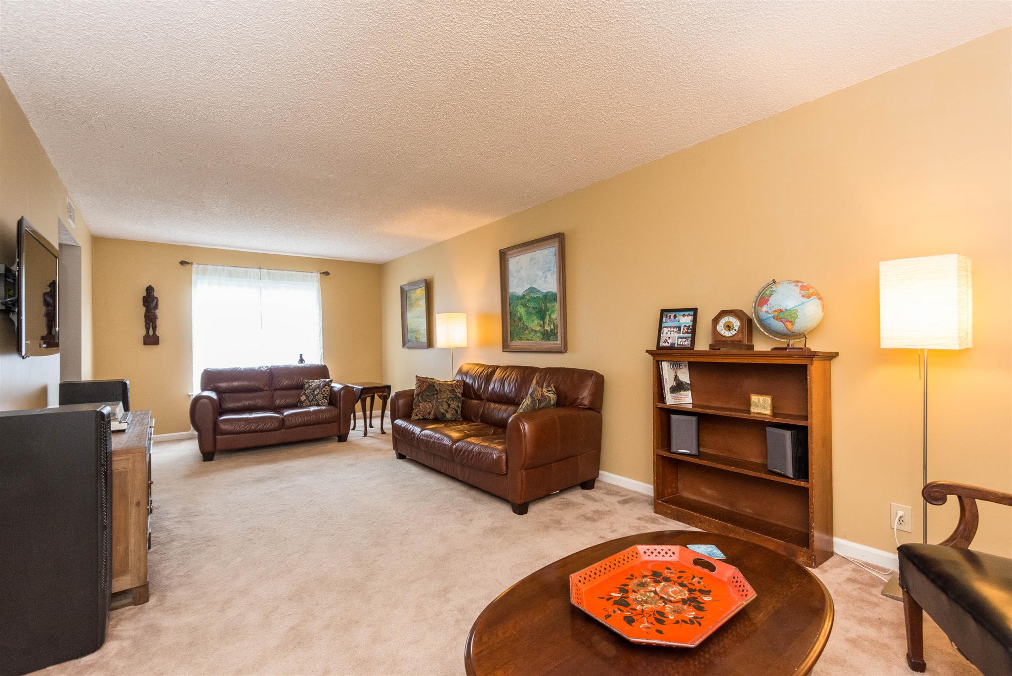 316 Cedarcliff Road Antioch, TN 37013 - Photo 11 of 27 a living room with furniture and a flat screen tv