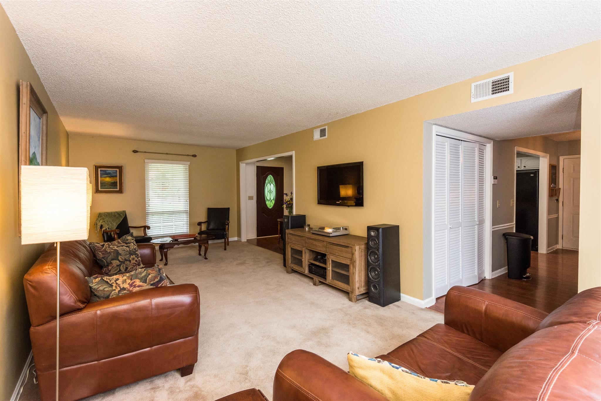 316 Cedarcliff Road Antioch, TN 37013 - Photo 9 of 27 a living room with furniture and a flat screen tv