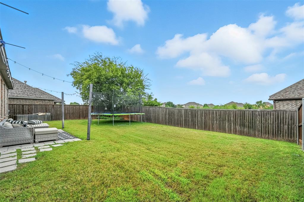 1160 Red Hawk Lane Forney, TX 75126 - Photo 25 of 33 a view of swimming pool with a yard