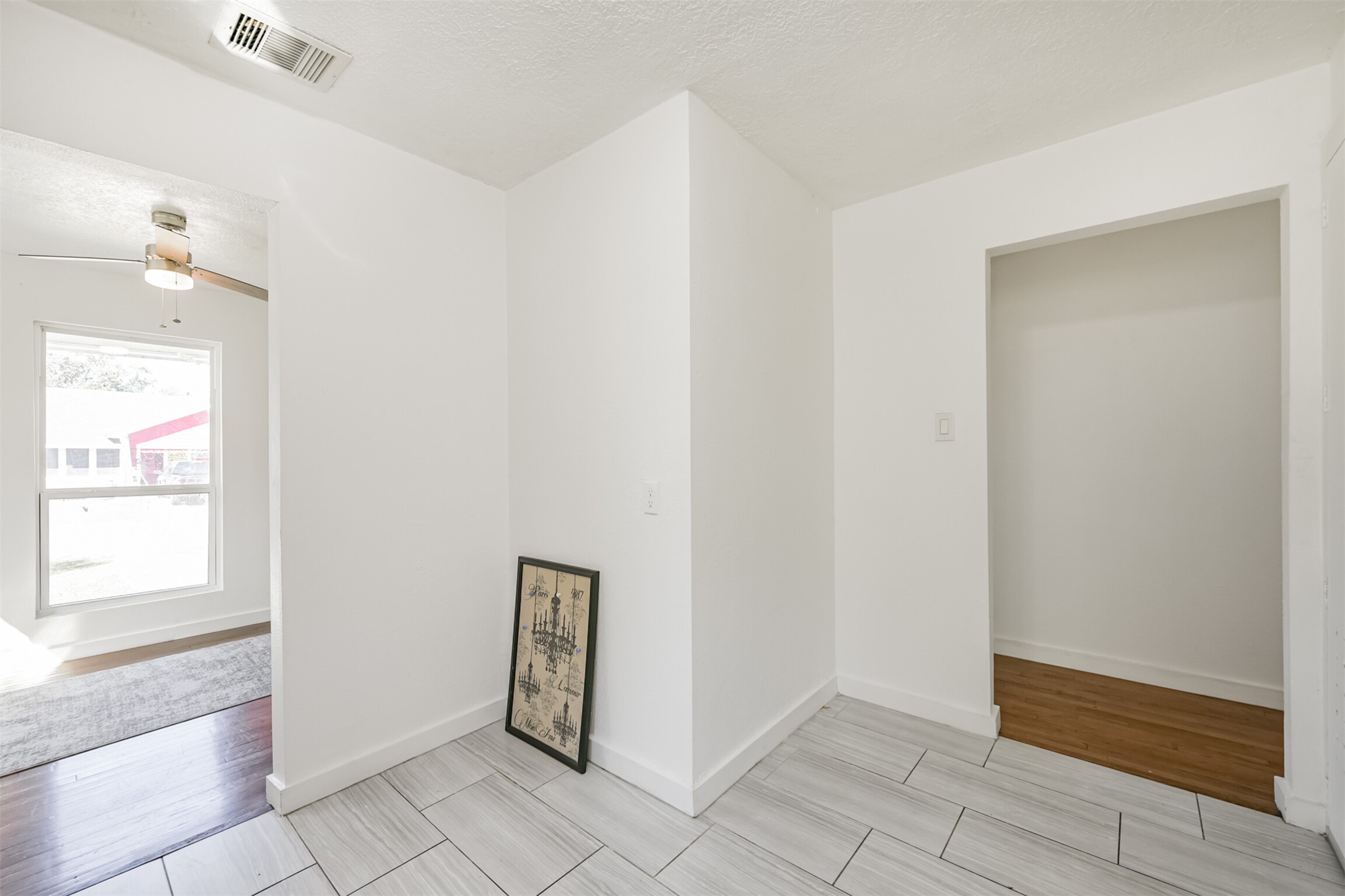 7546 Greendowns Street Houston, TX 77087 - Photo 15 of 33 a view of an empty room and window