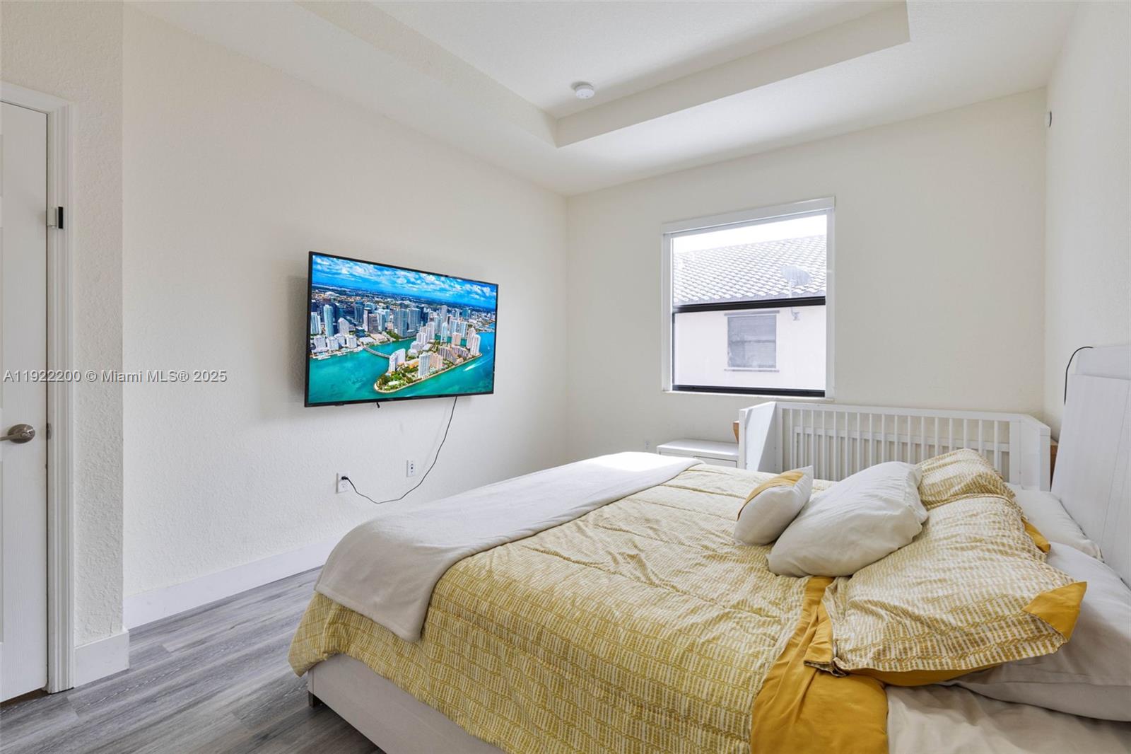 15070 Southwest 119TH Lane Miami, FL 33196 - Photo 11 of 30 a bedroom with a bed and a window