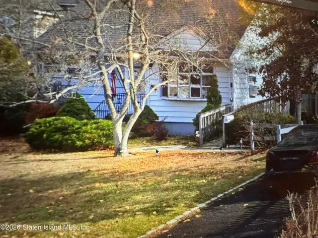 a view of a pool with an outdoor space