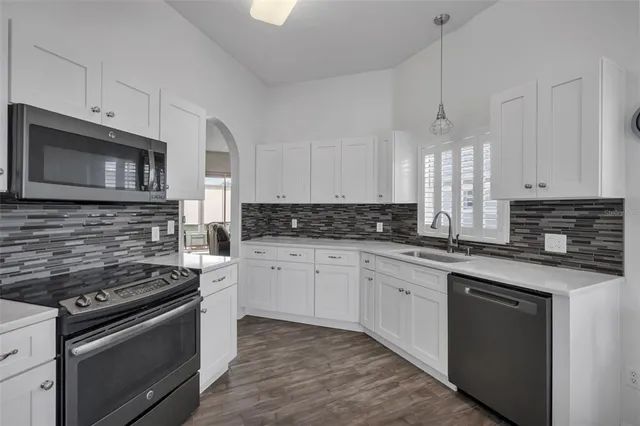 a view of a workspace with furniture