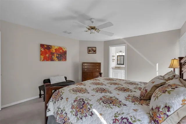 a outdoor living space with furniture and a ceiling fan view