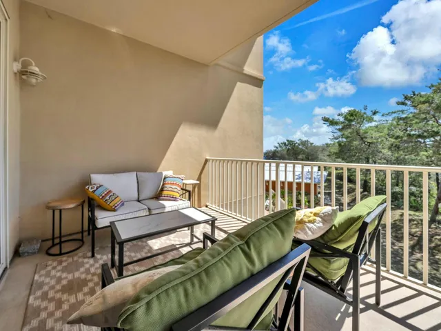 a view of a city with an ocean