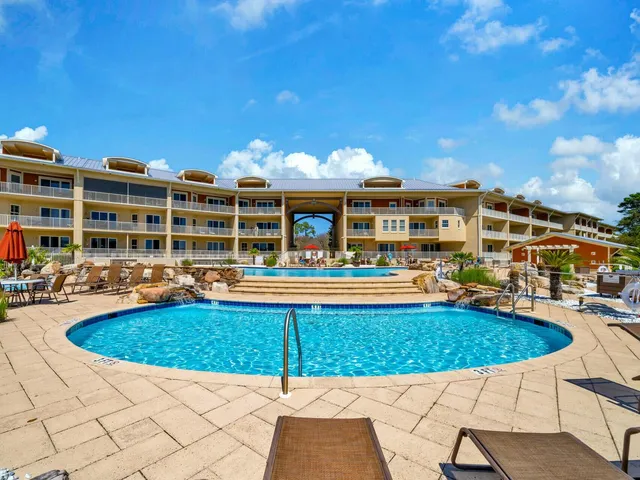 a outdoor space with lots of tables and chairs