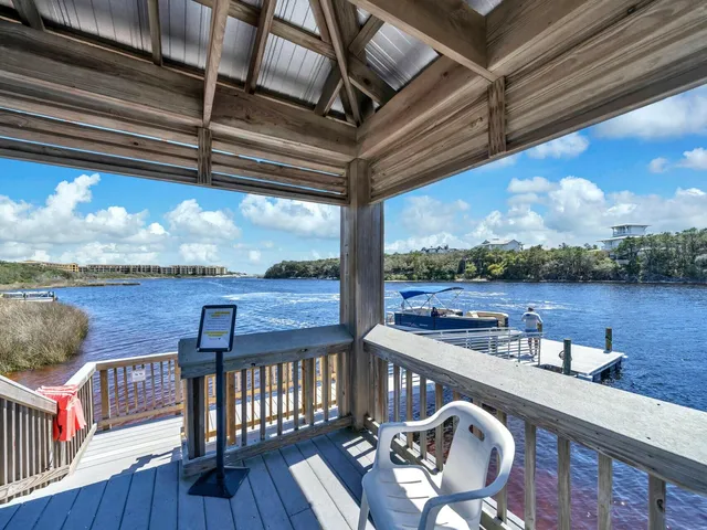 a view of parking garage with cars