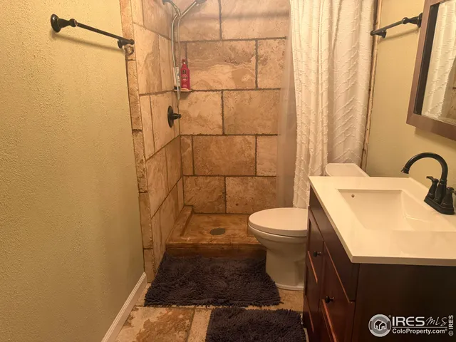 a bathroom with a sink and a toilet