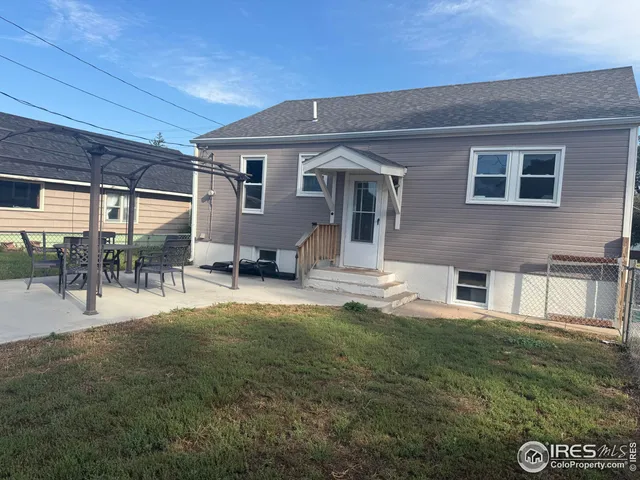 a view of a house with a patio