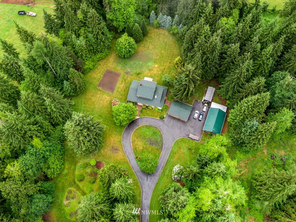 23402 Wallitner Road Arlington, WA 98223 - Photo 13 of 39 an aerial view of a house with outdoor space swimming pool