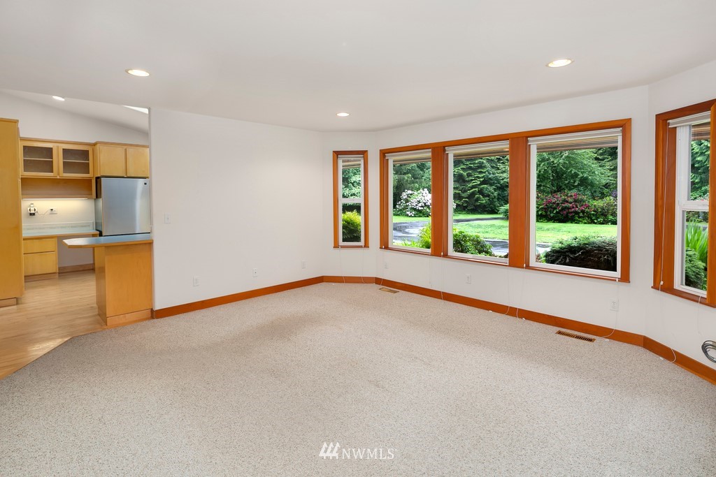 23402 Wallitner Road Arlington, WA 98223 - Photo 17 of 39 a view of an empty room with a window
