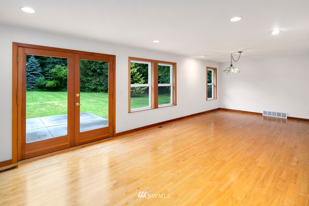 23402 Wallitner Road Arlington, WA 98223 - Photo 21 of 39 a view of an empty room with a window