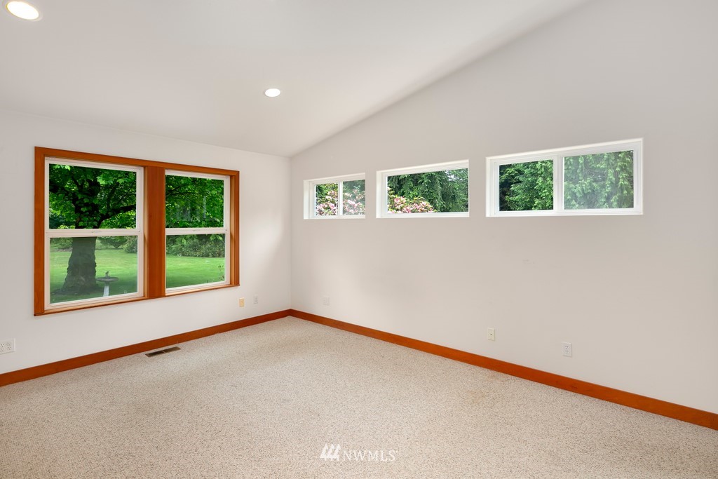 23402 Wallitner Road Arlington, WA 98223 - Photo 25 of 39 a view of an empty room with a window