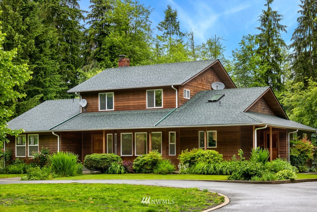 23402 Wallitner Road Arlington, WA 98223 - Photo 4 of 39 a front view of a house with a yard